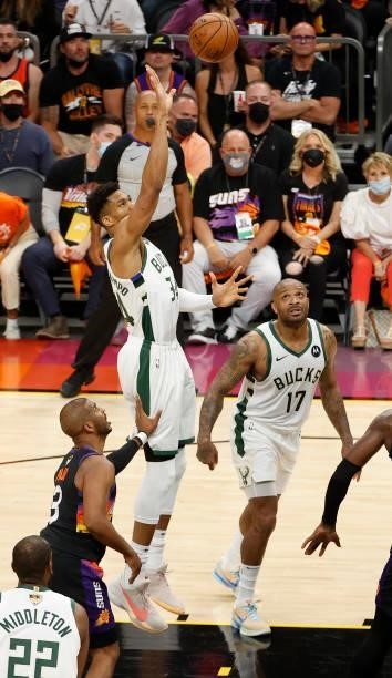 Giannis Antetokounmpo of the Milwaukee Bucks shoots against the Phoenix Suns during the first half in Game Five of the NBA Finals at Footprint Center...