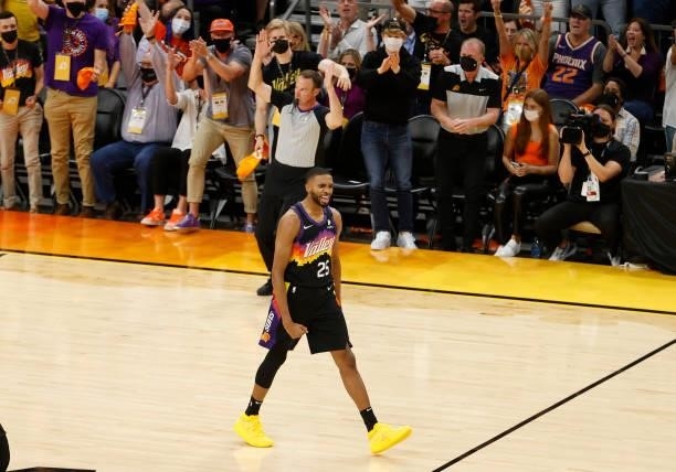 Mikal Bridges of the Phoenix Suns celebrates a basket against the Milwaukee Bucks during the first half in Game Five of the NBA Finals at Footprint...