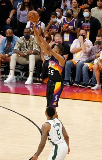 Mikal Bridges of the Phoenix Suns shoots a basket against the Milwaukee Bucks during the first half in Game Five of the NBA Finals at Footprint...