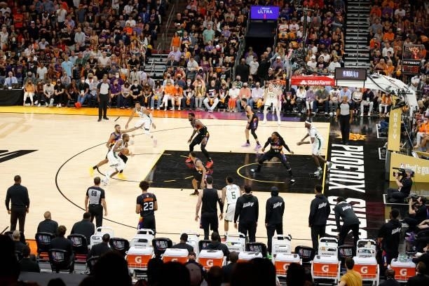 Khris Middleton of the Milwaukee Bucks drives to the basket against the against the Phoenix Suns during the first half in Game Five of the NBA Finals...