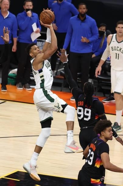 Giannis Antetokounmpo of the Milwaukee Bucks shoots against the Phoenix Suns during the second half in Game Five of the NBA Finals at Footprint...