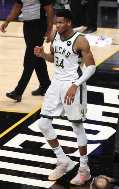Giannis Antetokounmpo of the Milwaukee Bucks celebrates against the Phoenix Suns during the second half in Game Five of the NBA Finals at Footprint...