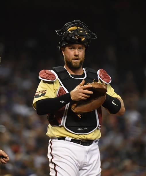 Bryan Holaday of the Arizona Diamondbacks looks out from behind home plate against the Chicago Cubs at Chase Field on July 16, 2021 in Phoenix,...