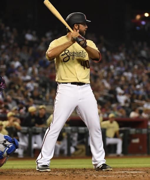 Madison Bumgarner of the Arizona Diamondbacks gets ready in the batters box against the Chicago Cubs at Chase Field on July 16, 2021 in Phoenix,...