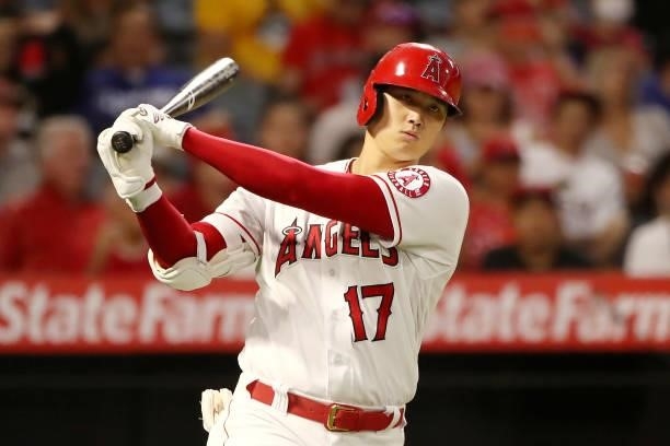 Shohei Ohtani of the Los Angeles Angels looks on during his at bat during the sixth inning against the Seattle Mariners at Angel Stadium of Anaheim...