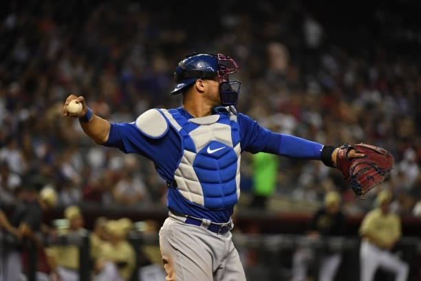 Wilson Contreras of the Chicago Cubs throws the ball back to the pitchers mound against the Arizona Diamondbacks at Chase Field on July 16, 2021 in...