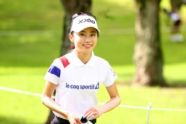 Yuka Yasuda of Japan smiles on her way to the 11th tee during third round of the GMO Internet Ladies Samantha Thavasa Global Cup at Eagle Point Golf...