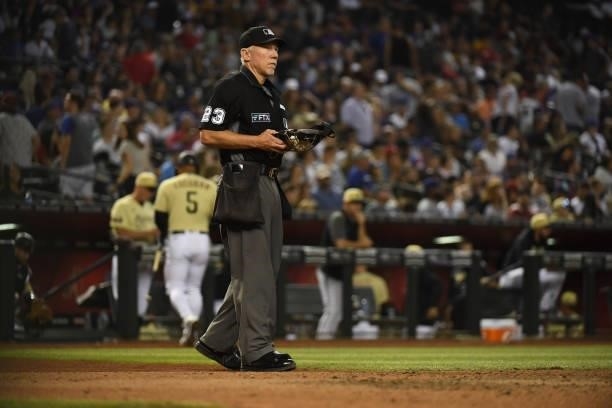 Home plate umpire Lance Barksdale looks out from behind home plate during a game between the Arizona Diamondbacks and Chicago Cubs at Chase Field on...