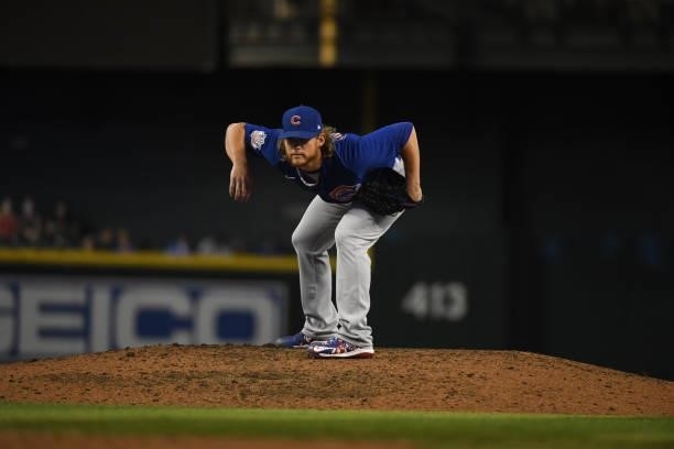 Craig Kimbrel of the Chicago Cubs delivers a ninth inning pitch against the Arizona Diamondbacks at Chase Field on July 16, 2021 in Phoenix, Arizona....