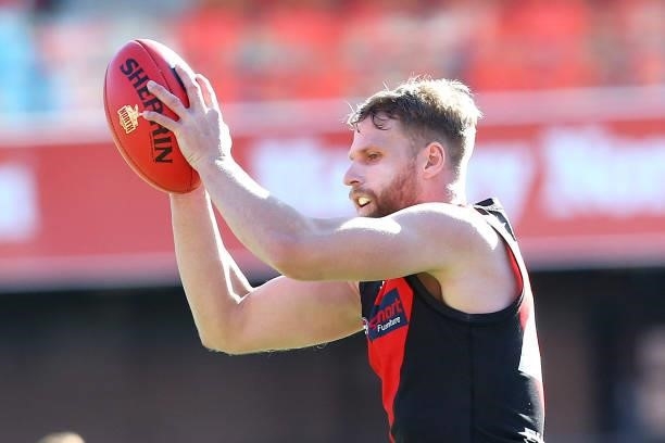 Jake Stringer of the Bombers marks the ball during the round 18 AFL match between North Melbourne Kangaroos and Essendon Bombers at Metricon Stadium...
