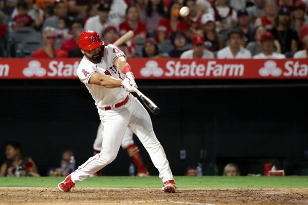 Jack Mayfield of the Los Angeles Angels hits a double during the eighth inning against the Seattle Mariners at Angel Stadium of Anaheim on July 17,...
