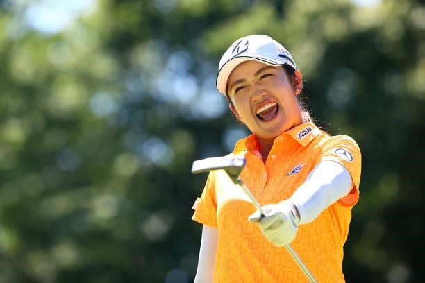 Mone Inami of Japan celebrates after holing out with the birdie on the 18th green during third round of the GMO Internet Ladies Samantha Thavasa...
