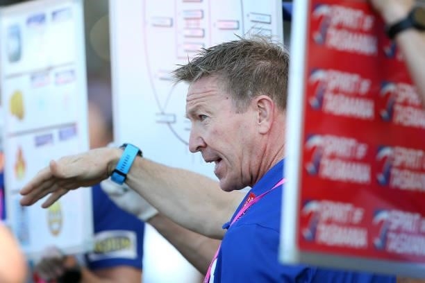 Kangaroos coach David Noble talks to his team during the round 18 AFL match between North Melbourne Kangaroos and Essendon Bombers at Metricon...
