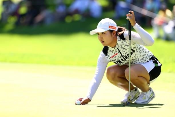 Sayaka Takahashi of Japan lines up a putt on the 18th green during third round of the GMO Internet Ladies Samantha Thavasa Global Cup at Eagle Point...