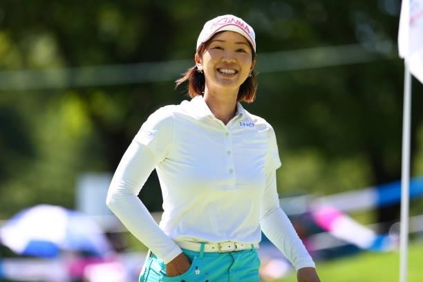 Rumi Yoshiba of Japan smiles after holing out on the 18th green during third round of the GMO Internet Ladies Samantha Thavasa Global Cup at Eagle...