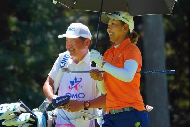 Maiko Wakabayashi of Japan shares a luagh with her caddie on the 9th hole during third round of the GMO Internet Ladies Samantha Thavasa Global Cup...