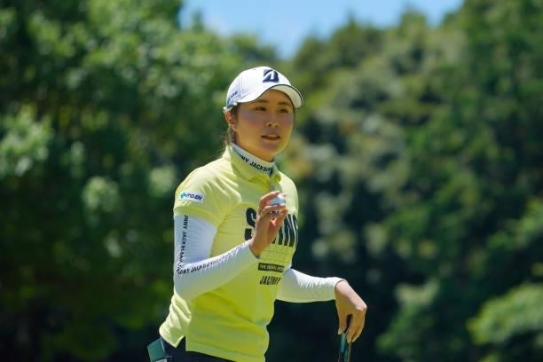 Momoko Osato of Japan acknowledges fans on the 9th green during third round of the GMO Internet Ladies Samantha Thavasa Global Cup at Eagle Point...