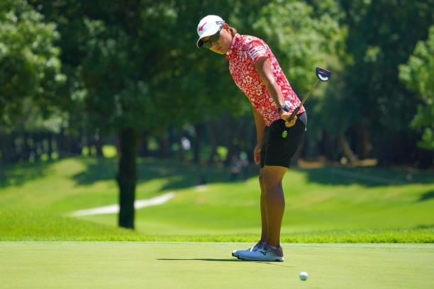 Mao Nozawa of Japan holes the birdie putt on the 8th green during third round of the GMO Internet Ladies Samantha Thavasa Global Cup at Eagle Point...