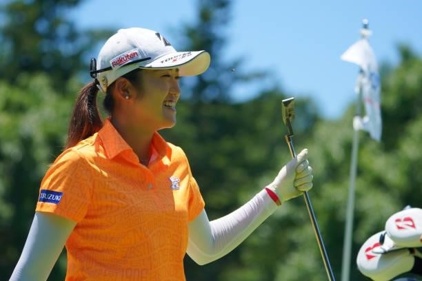 Mone Inami of Japan smiles on the 8th green during third round of the GMO Internet Ladies Samantha Thavasa Global Cup at Eagle Point Golf Club on...