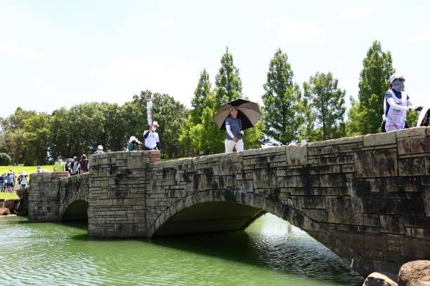 Sumika Nakasone of Japan crosses the bridge on the 8th hole during third round of the GMO Internet Ladies Samantha Thavasa Global Cup at Eagle Point...