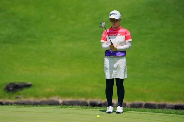 Asuka Ishikawa of Japan lines up a putt on the 7th green during third round of the GMO Internet Ladies Samantha Thavasa Global Cup at Eagle Point...
