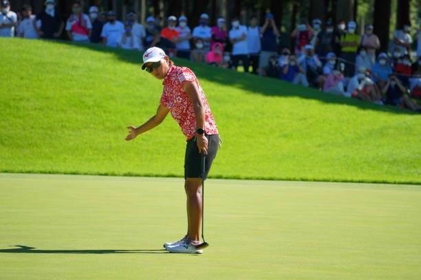 Mao Nozawa of Japan reacts after a putt on the 18th green on the playoff first hole during final round of the GMO Internet Ladies Samantha Thavasa...