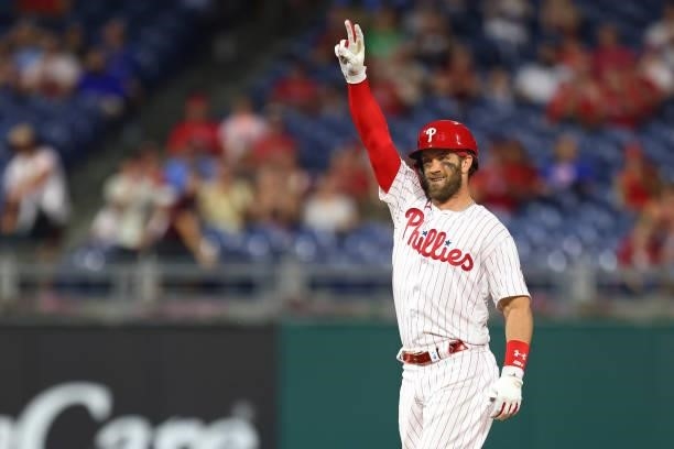 Bryce Harper of the Philadelphia Phillies gestures after he hit a double against the Miami Marlins during a game at Citizens Bank Park on July 17,...