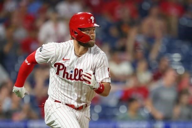 Bryce Harper of the Philadelphia Phillies hits a double against the Miami Marlins during a game at Citizens Bank Park on July 17, 2021 in...