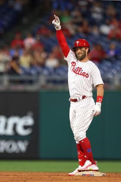 Bryce Harper of the Philadelphia Phillies gestures after he hit a double against the Miami Marlins during a game at Citizens Bank Park on July 17,...
