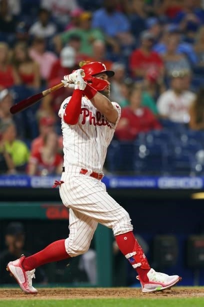Bryce Harper of the Philadelphia Phillies hits a double against the Miami Marlins during a game at Citizens Bank Park on July 17, 2021 in...
