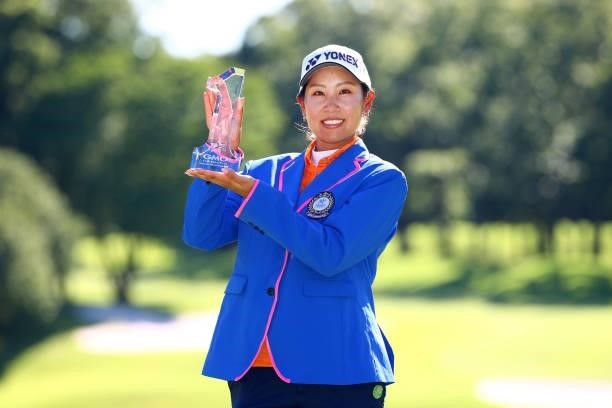 Maiko Wakabayashi of Japan poses with the trophy after winning the tournament following the final round of the GMO Internet Ladies Samantha Thavasa...