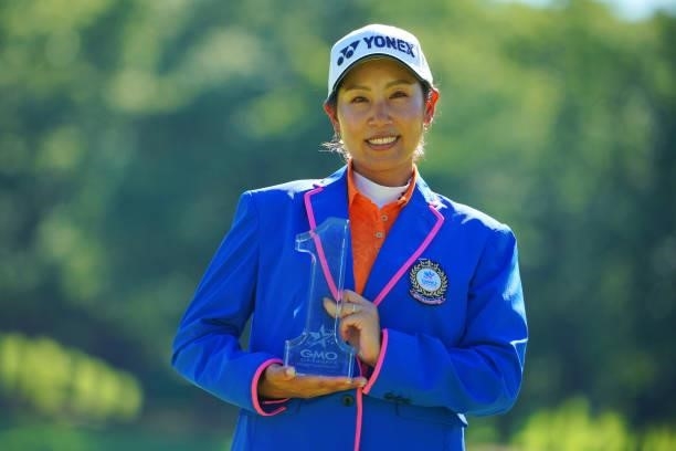 Maiko Wakabayashi of Japan poses with the trophy after winning the tournament following the final round of the GMO Internet Ladies Samantha Thavasa...