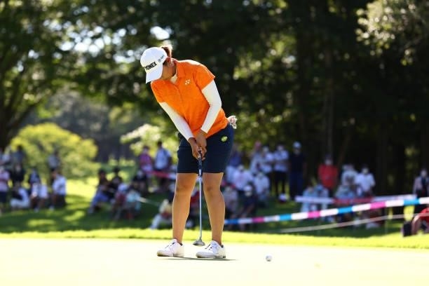 Maiko Wakabayashi of Japan holes the winning putt on the 18th green on the playoff second hole during final round of the GMO Internet Ladies Samantha...