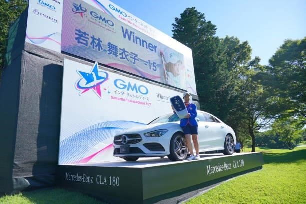 Winner Maiko Wakabayashi of Japan poses after winning the tournament following the final round of the GMO Internet Ladies Samantha Thavasa Global Cup...