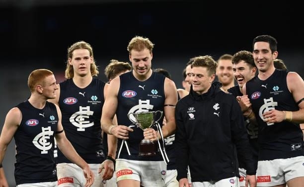 Harry Mckay of the Blues is seen with the Peter Mac Cup after the Blues defeated the Magpies during the round 18 AFL match between Collingwood...