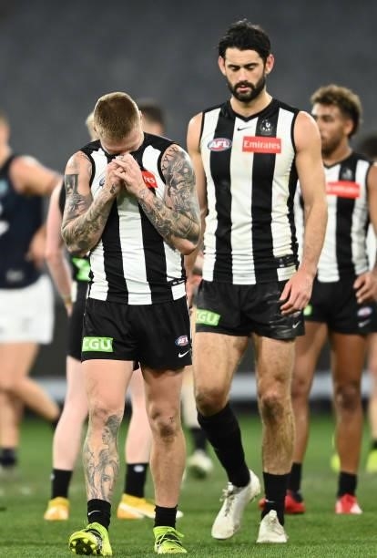 Jordan De Goey of the Magpies reacts after the Magpies were defeated by the Blues during the round 18 AFL match between Collingwood Magpies and...