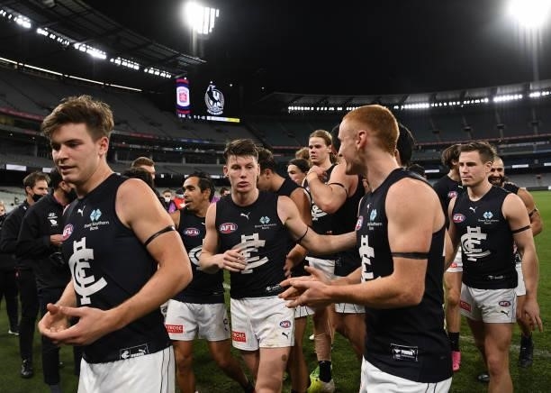 Sam Walsh of the Blues celebrates with team mates after the Blues defeated the Magpies during the round 18 AFL match between Collingwood Magpies and...