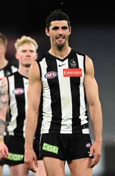 Scott Pendlebury of the Magpies walks off after the Magpies were defeated by the Blues during the round 18 AFL match between Collingwood Magpies and...