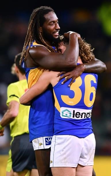Nic Naitanui of the Eagles hugs Connor West of the Eagles at the final siren during the round 18 AFL match between Adelaide Crows and West Coast...