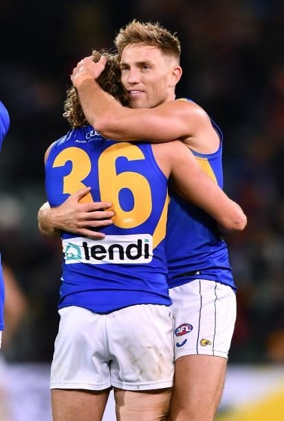Connor West of the Eagles hugs Brad Sheppard of the Eagles after the final siren during the round 18 AFL match between Adelaide Crows and West Coast...