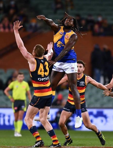 Nic Naitanui of the Eagles rucks against Reilly O'Brien of the Crows during the round 18 AFL match between Adelaide Crows and West Coast Eagles at...