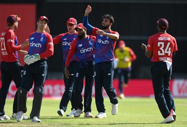 Saqib Mahmood of England celebrates dismissing Pakistan captain Babar Azam during the Second Vitality International T20 match between England and...