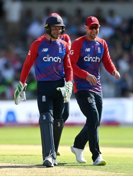 Liam Livingstone and Jos Buttler of England share a joke during the Second Vitality International T20 match between England and Pakistan at Emerald...