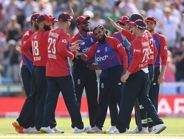 Adil Rashid of England is congratulated after dismissing Mohammad Rizwan of Pakistan during the 2nd Vitality T20 International between England and...