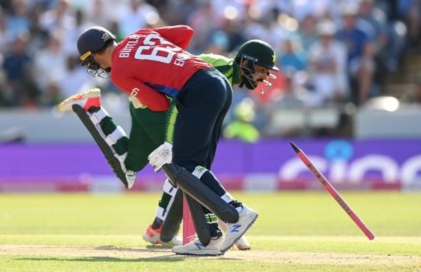 Jos Buttler of England attempts to run out Shadab Khan of Pakistan during the 2nd Vitality T20 International between England and Pakistan at Emerald...