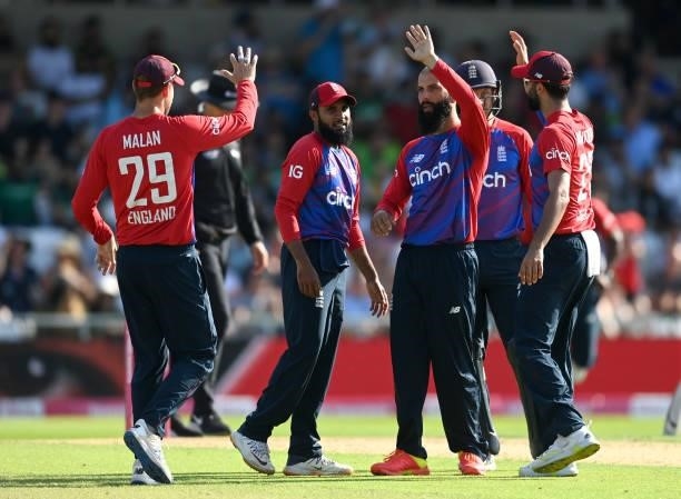 Moeen Ali of England celebrates with teammates after dismissing Fakhar Zaman of Pakistan during the Second Vitality International T20 match between...