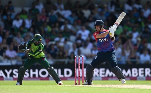 Liam Livingstone of England bats watched by Pakistan wicketkeeper Mohammad Rizwan during the Second Vitality International T20 match between England...