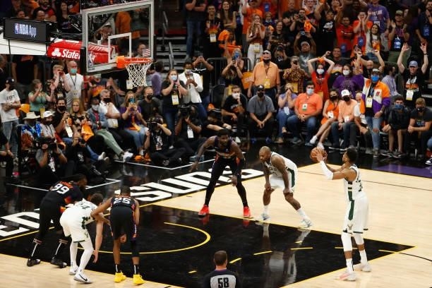 Giannis Antetokounmpo of the Milwaukee Bucks shoots a free-throw shot against the Phoenix Suns in the second half of game five of the NBA Finals at...