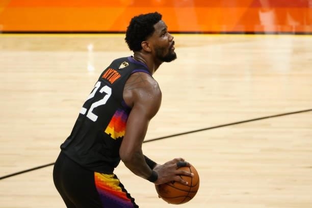 Deandre Ayton of the Phoenix Suns attempts a free-throw shot against the Milwaukee Bucks in the second half of game five of the NBA Finals at...