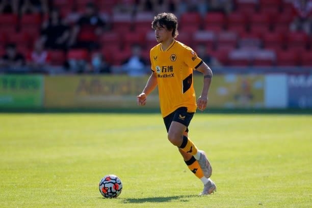 Hugo Bueno of Wolverhampton Wanderers runs with the ball during the pre-season friendly between Crewe Alexandra and Wolverhampton Wanderers at Gresty...